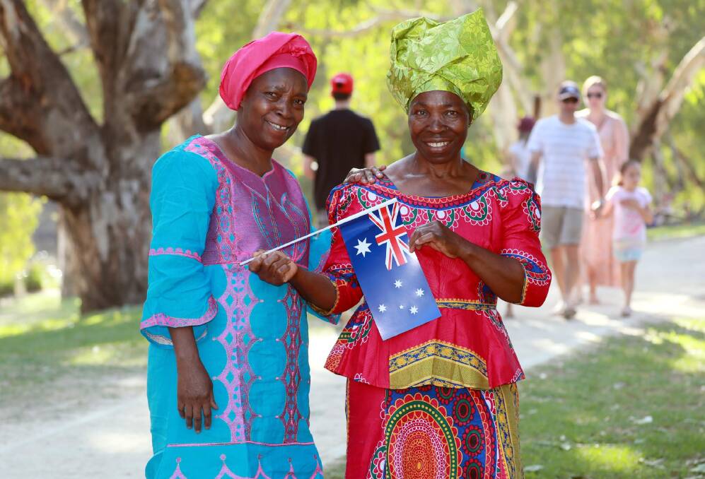 NEW FOUND LAND: Irene Debrah with mother Rebecca Debrah celebrated on Sunday after having come to call Wagga home for the past nine years. Together, they fled wartorn Sierra Leone. Picture: Les Smith