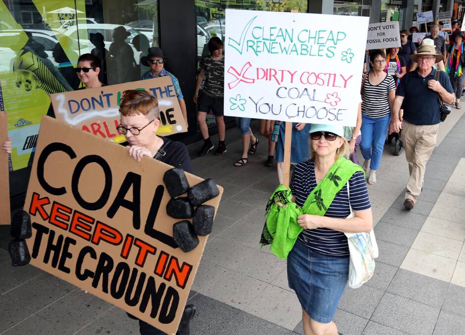 TOGETHER IN PROTEST: Climate change protesters march from the railway station, along Baylis Street to Wollundry amphitheatre earlier this year. Picture: Les Smith