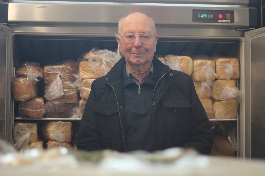 FOOD SCARCITY: Phil Sheather in front of the food mission's refrigerator full of bread - that will be emptied by the end of the week. Picture: Emma Horn