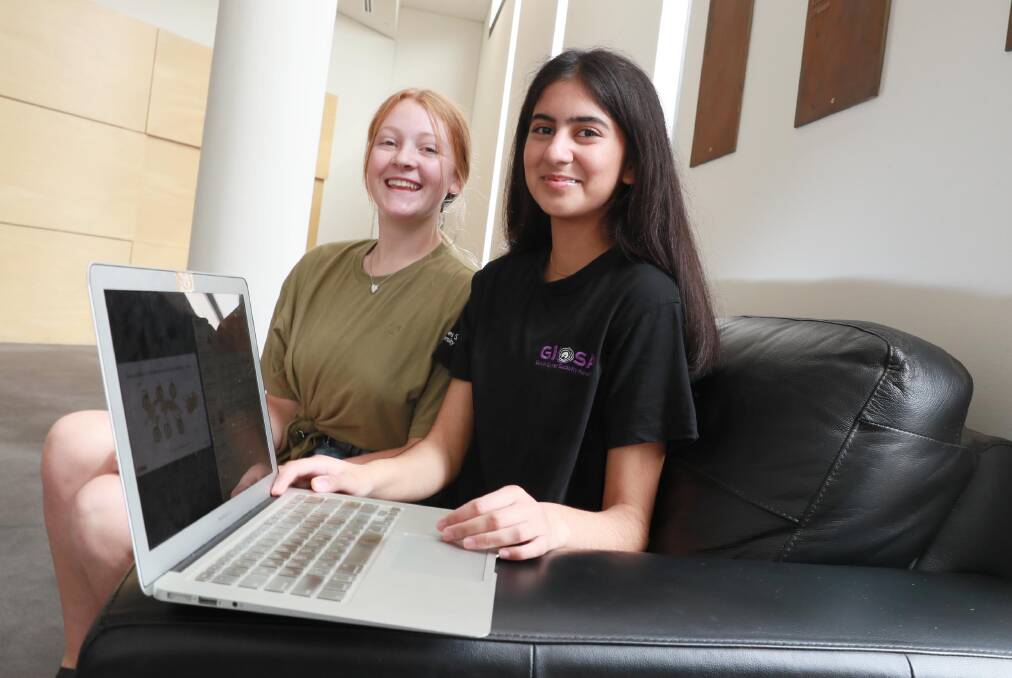 CRACKING CODES: Sarah Siddiqui, aged 14, and Isabel Brown, aged 15, are hoping to break down barriers in the male-dominated field of cybersecurity. Picture: Les Smith