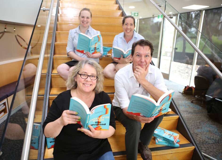 BOOK CLUB: Wagga library programs coordinator Christine Bolton, with programs officers Peter Casey, Jeannie Hazell and Wendy Harper, getting into Charlotte Wood's 'The Weekend'. Picture: supplied.