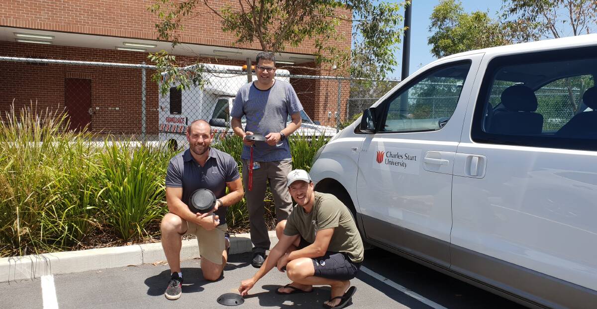 Dr Sabih Rehman and researchers at CSU with the parking sensors used in test sequences. Picture: supplied