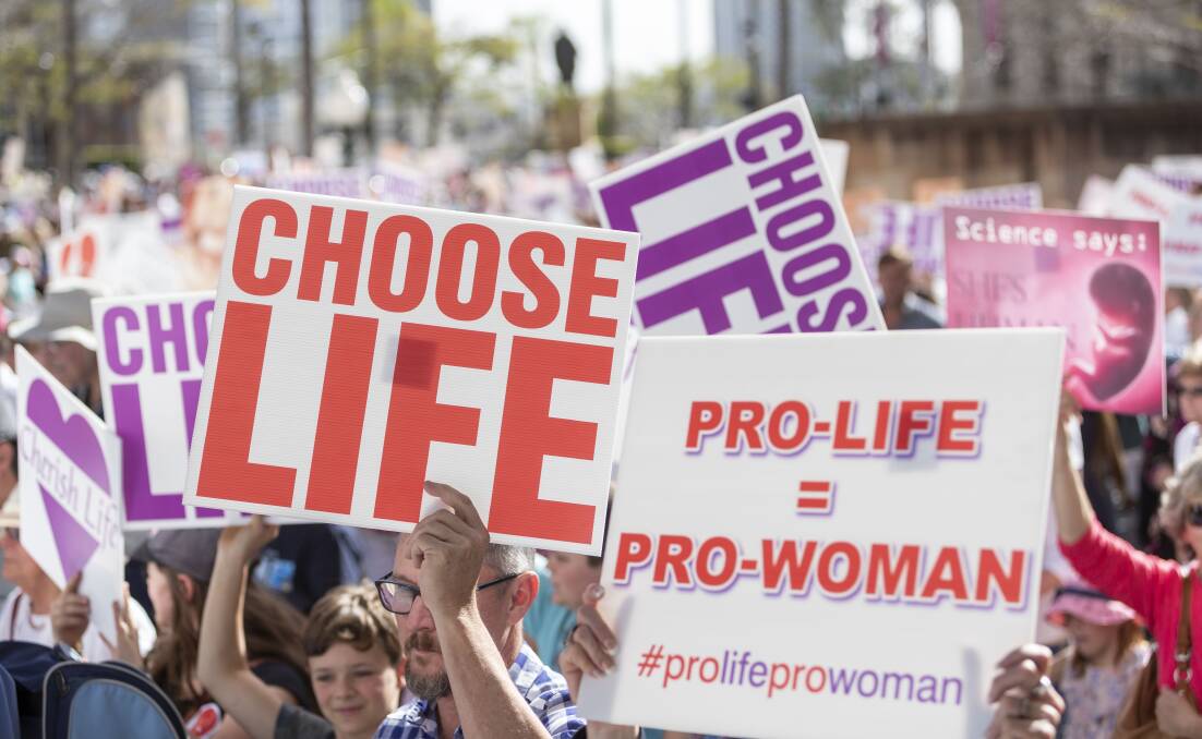 PRO LIFE, PRO CHOICE: Thousands of people protest the Queensland government's move to decriminalise abortion in September 2018. Picture: AAP/Glenn Hunt