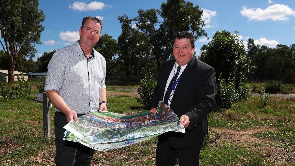 PLANS FOR DESIGN: Wagga City Council's Ben Creighton and Michael Keys are inviting public feedback on four designs for the Riverside super park. Picture: Emma Hillier