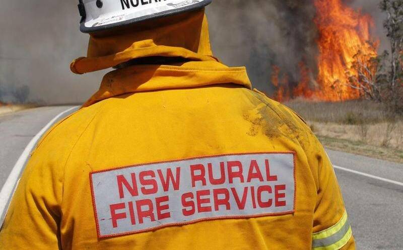 FIRING LINE: Riverina RFS have subdued a grass fire on the highway near Wagga. Picture: FILE