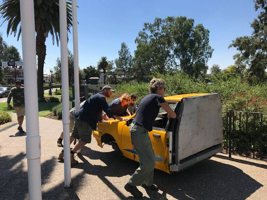 VANDALISM: The halved yellow vehicle was installed by council workers on March 8, as part of the International Women's Day exhibition. Picture: supplie