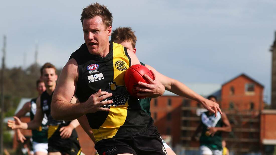  BACK AT HOME: Experienced footballer Josh Gaynor in action for Wagga Tigers in the preliminary final win over Coolamon last Sunday. Picture: Emma Hillier