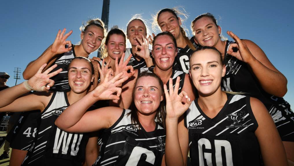 The Rock-Yerong Creek's netballers celebrate their third straight Farrer League netball premiership after Saturday's grand final win over CSU.