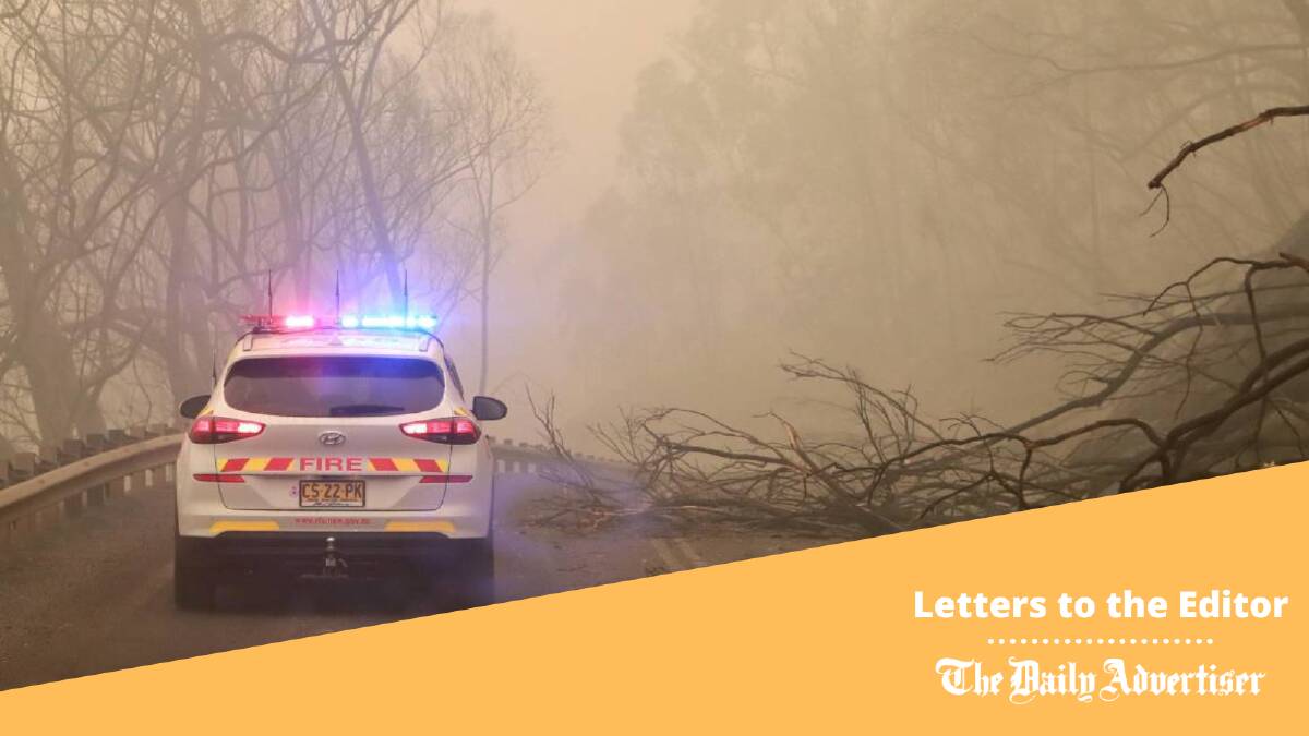 Emergency vehicles comb through the aftermath of fires between Wondalga and Batlow in January 2020. Picture: Les Smith