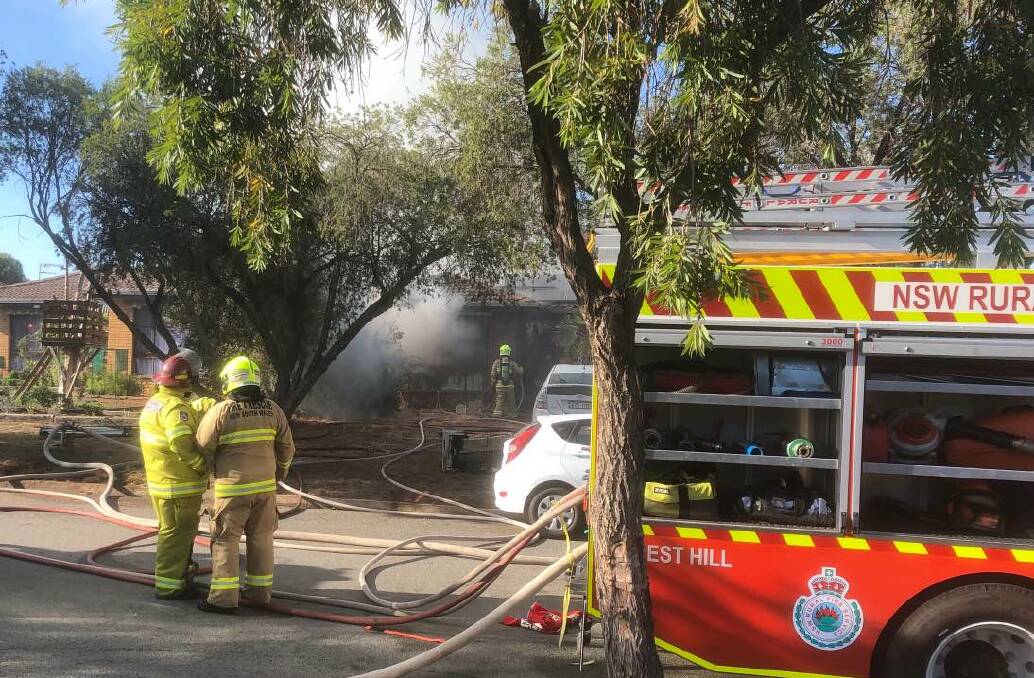 Emergency services at the scene of a house fire in Forest Hill on Thursday morning. Picture: Rex Martinich