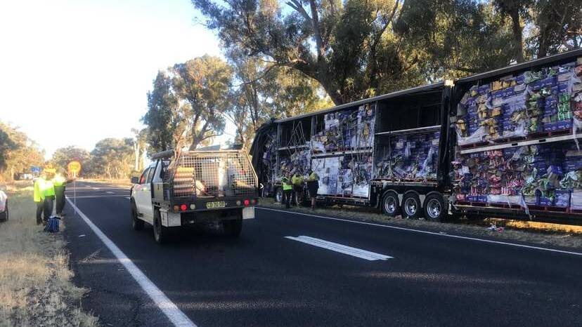 Traffic slowly passes the site where two trucks sideswiped each other on the Sturt Highway on Friday morning. Picture: Jessica McLaughlin