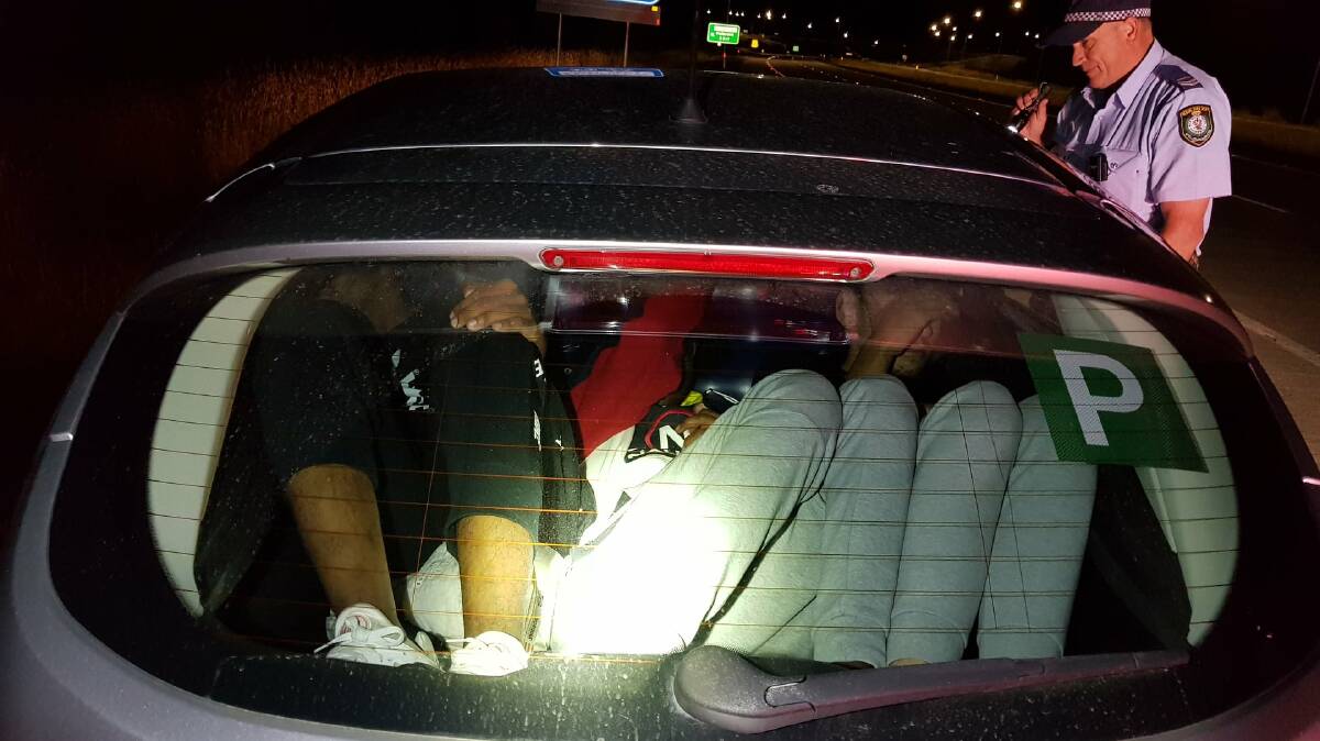 Police found three people laying back on an air mattress when they stopped a speeding car at Holbrook on Sunday night. Picture: NSW Police Traffic and Highway Patrol Command