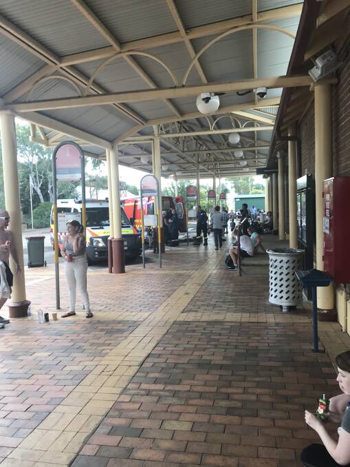 Passengers mill at Cootamundra train station after the Sydney-bound XPT was forced to turn back. Picture: Supplied