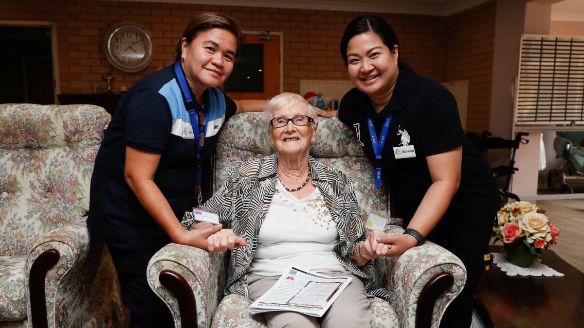 Among Coolamon's newest residents are aged care workers Lyn Coralde and Vanessa Hipolito, who have recently arrived from the Philippines, with Allawah Lodge resident Aileen Stevens. Picture by Les Smith