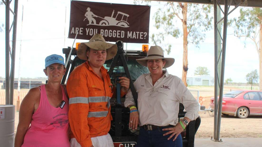 Carrie Smart with her son Mitch, and 'Are you Bogged Mate?' founder Mary O'Brien at the Dirranbandi Ute Muster last Saturday. Picture: Helen Walker