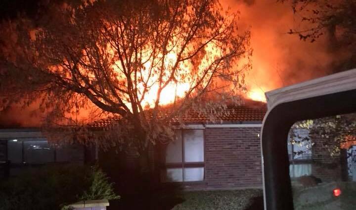 A Glenfield Park home was destroyed by fire on Sunday night. Picture: Fire and Rescue NSW Station 472 Turvey Park