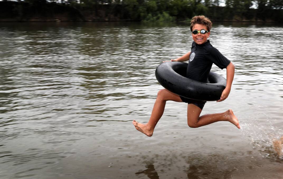 George Kieck goes for a dip at Wagga Beach. Picture: Les Smith
