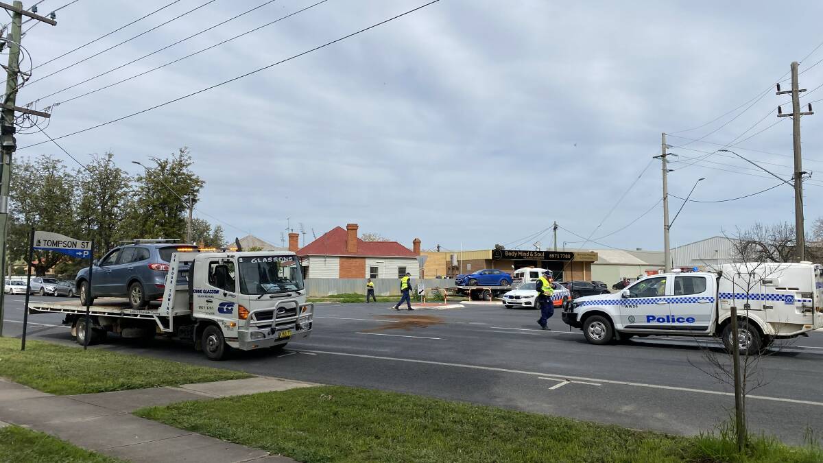 TOWED: Two cars were loaded onto tow trucks after a crash in central Wagga on Wednesday. Picture: Andrew Pearson
