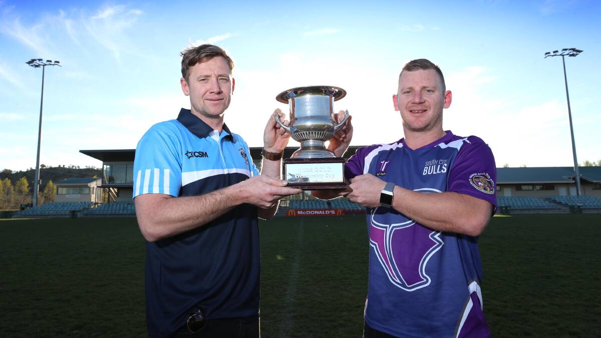 Tumut co-coach Dean Bristow and Southcity coach Kyle McCarthy with the premiership cup ahead of the Group Nine grand final. Picture: Les Smith