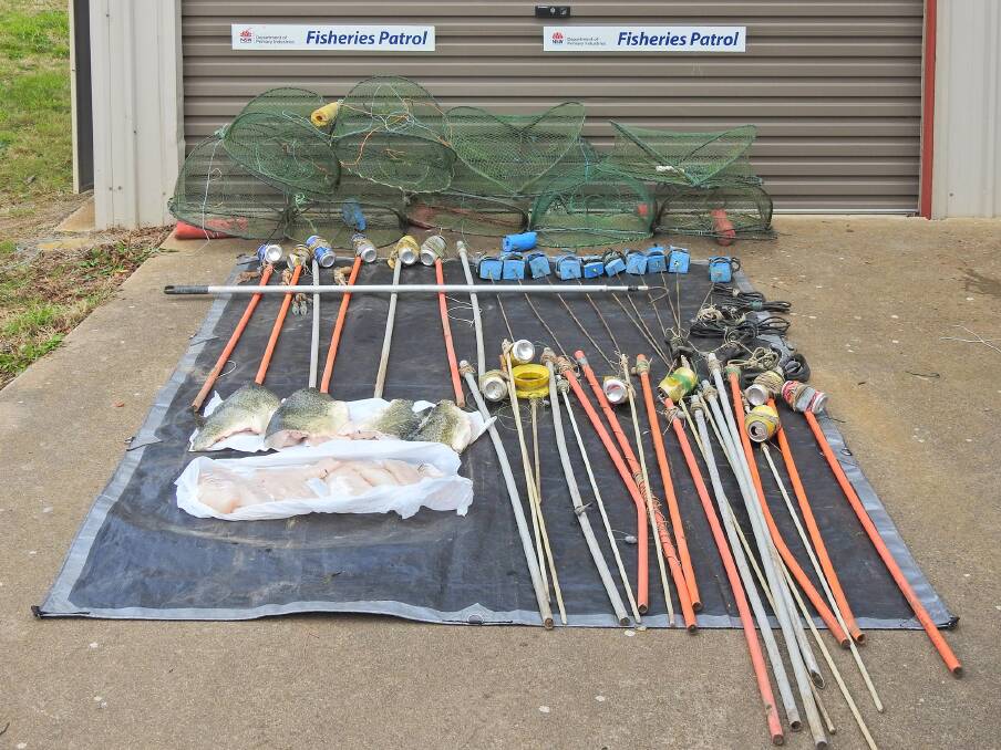 Two men lost dozens of lines, a stash of opera house yabby nets and more than six kilograms of Murray cod fillets in a bust by NSW Fisheries at Condobolin. Picture: NSW DPI Fisheries
