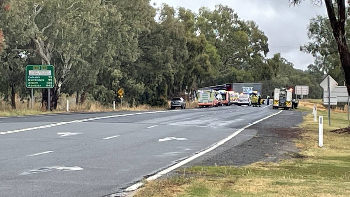 ON SCENE: Emergency services at the crash site just west of the Barbeques Galore roundabout on Sunday morning. Picture: Les Smith