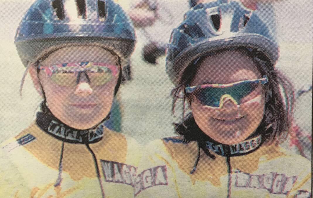 1998: Wagga's Naomi Pinto, 7, and Ellen Marks, 8, were all smiles after finishing the first two placegetters in the under nine one lap scratch event at Cootamundra on Saturday.