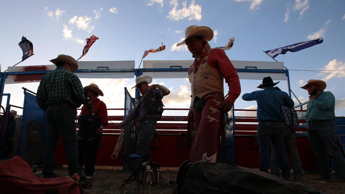 Riders prep for the saddle bronc event at the 2019 Wagga Pro Rodeo. Picture: Les Smith