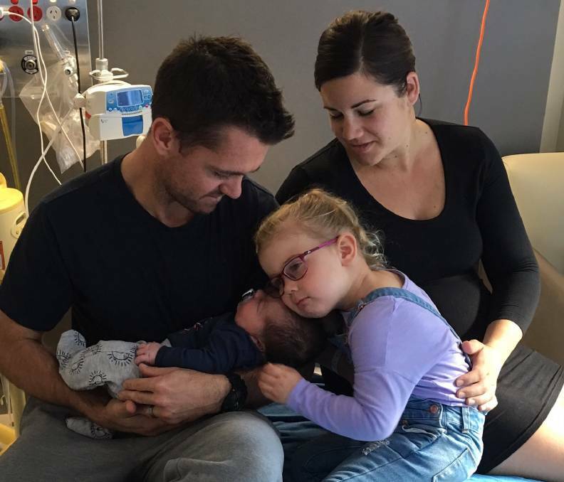 Kate and Justin Evans with newborn Easton and three-year-old Sienna. Not-so-little Easton was a record breaker for Wagga Base Hospital. Picture: Sally Druitt