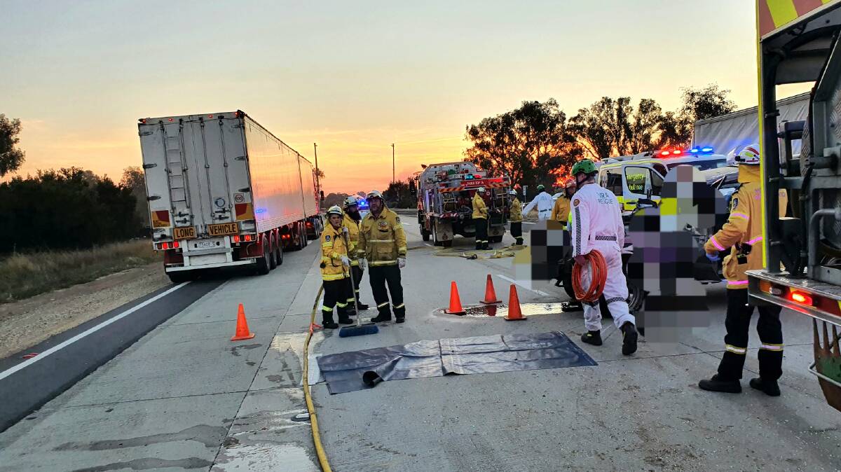 Emergency services at the scene after a 4WD towing a trailer and a truck crashed on the Hume Highway near Table Top on Wednesday. Picture: Albury & Border Rescue Squad - NSW Volunteer Rescue Association Inc.