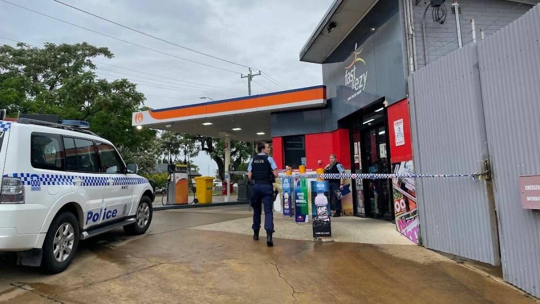 Police cordon off the Fast n Ezy in Mount Austin after a robbery on Thursday. Picture: Emily Wind