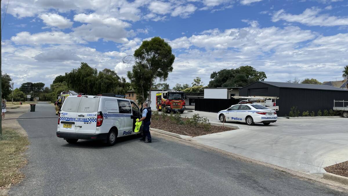 Emergency services at the rear of the Palm and Pawn Hotel in North Wagga, after a fire broke out in the laundry. Picture: Rex Martinich