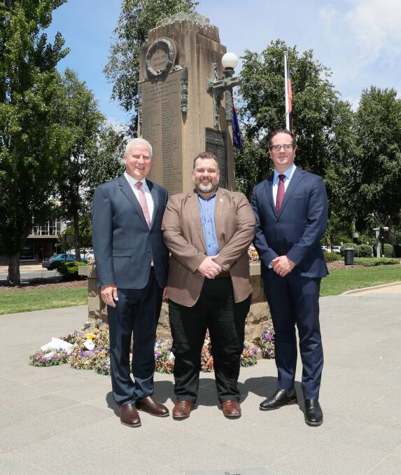 RSL Lifecare's David Anderson is flanked by Riverina MP Michael McCormack and veterans affairs minister Matt Keogh, who announced $1.8 million for veterans hubs in the city. Picture by Les Smith