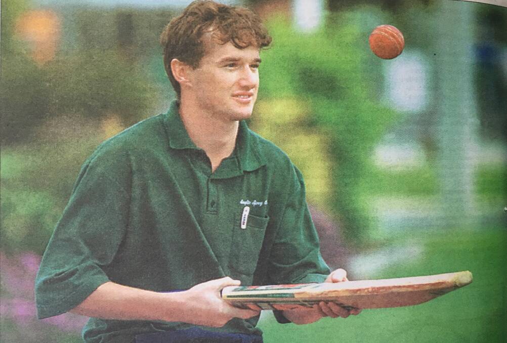 2000: Jason Malone displays some of his prowess with the cricket bat during a break from work in Griffith.