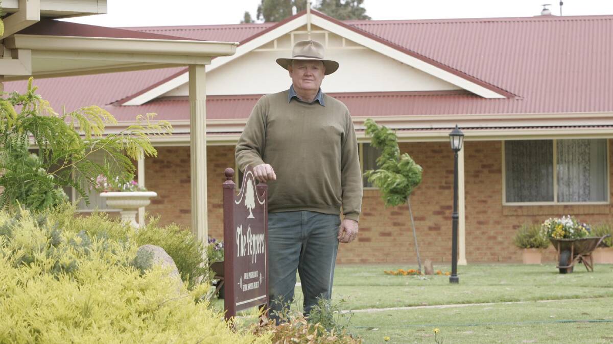 Nigel Judd outside The Peppers, the self-care units for retirees, in Ariah Park in 2006. File image