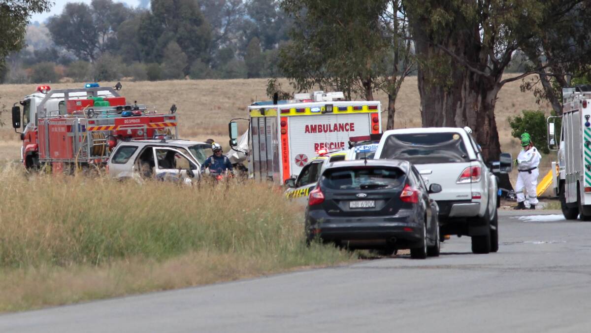 Emergency services at the scene of a head-on collision near Wagga that claimed two lives on Tuesday. Picture: Les Smith