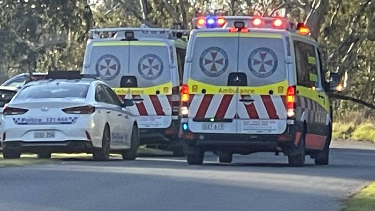 Police and ambulance vehicles at the Gumly scene. Picture: Taylor Dodge