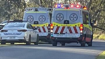 Police and ambulance vehicles at the Gumly scene. Picture: Taylor Dodge