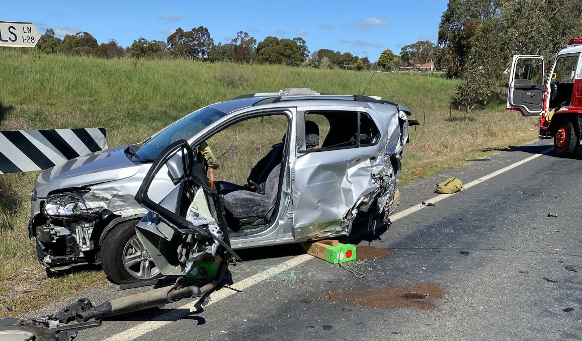 LUCKY ESCAPE: Firefighters had to free two women from this car after it crashed with a truck. Picture: Fire and Rescue NSW