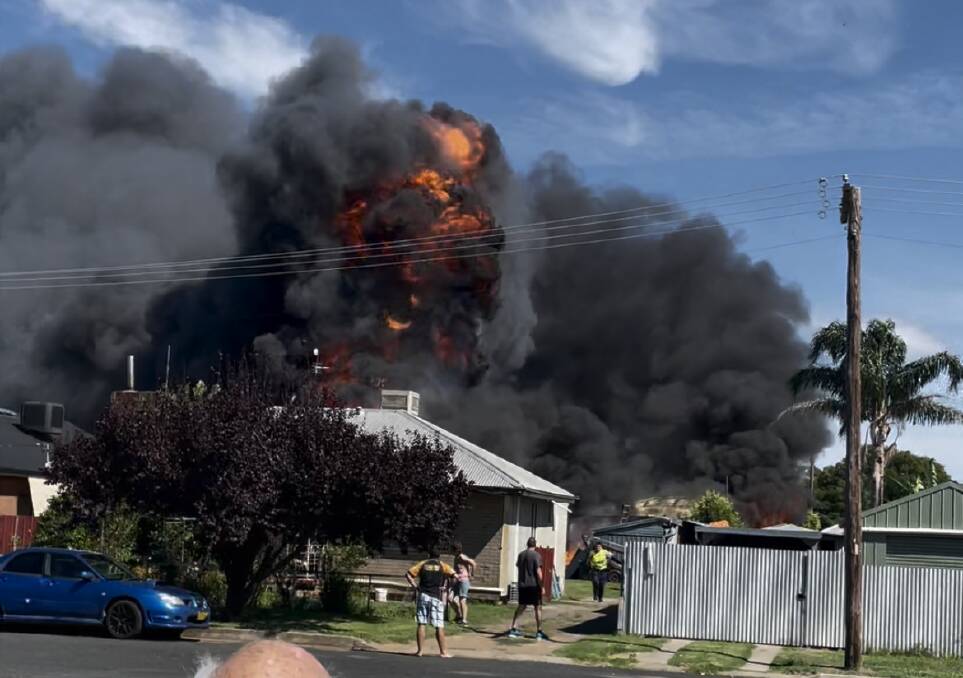 A ball of flames over the shed fire in Cootamundra. Picture: Brenton Tipping