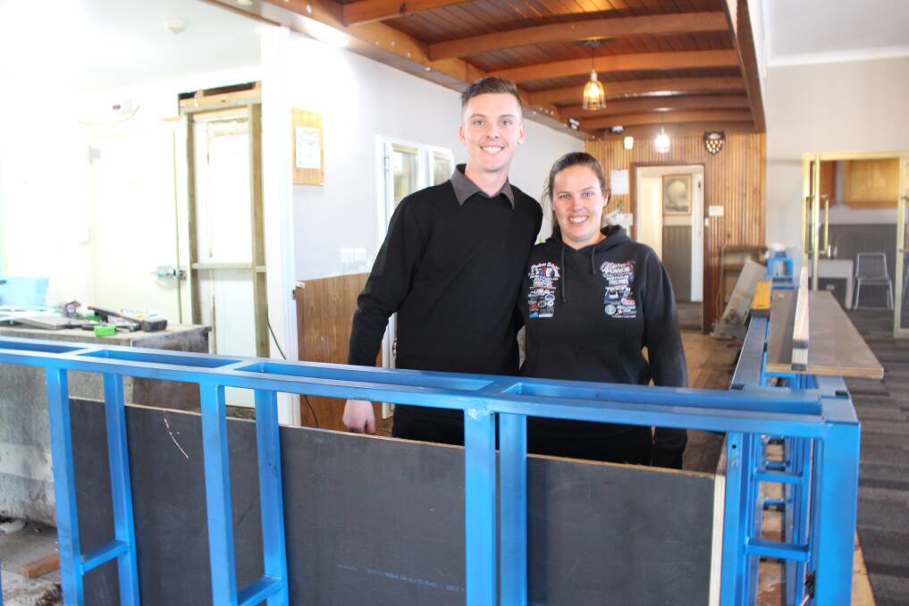 EXCITING TIMES: Barman Louis Dennis and Boat Club director Cin Evans check up on the progress of their brand new bar ahead of the big reveal on July 21.