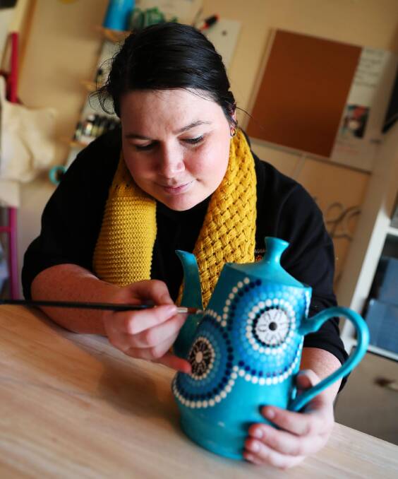 Ash Pengelly works away at one of her new teapots. Picture: Emma Hillier