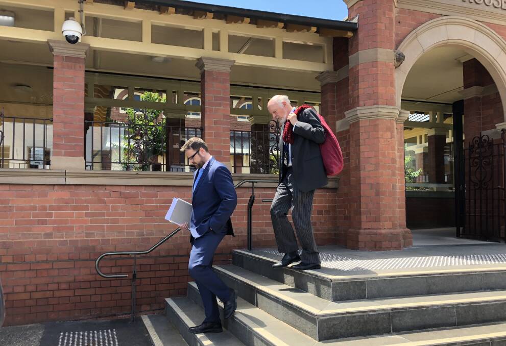 The mother's instructing solicitor Shaun Mortimer and senior counsel Eric Wilson leave the Wagga Courthouse after learning the verdict.
