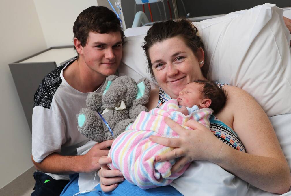 HAPPY FAMILY: Aaron Kelleher and Melody Betts with their newborn baby Nathan James Kelleher. Picture: Les Smith