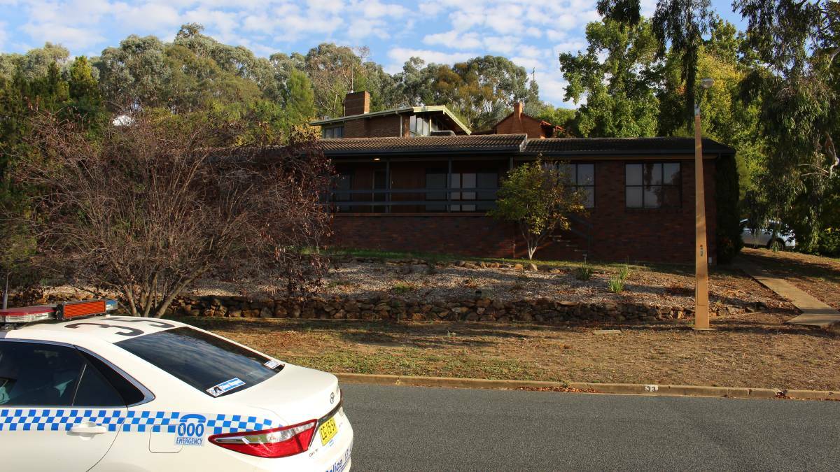Police carrying out work at the family's Kooringal home after two-month-old baby Archer Butler-Crichton died last April. 