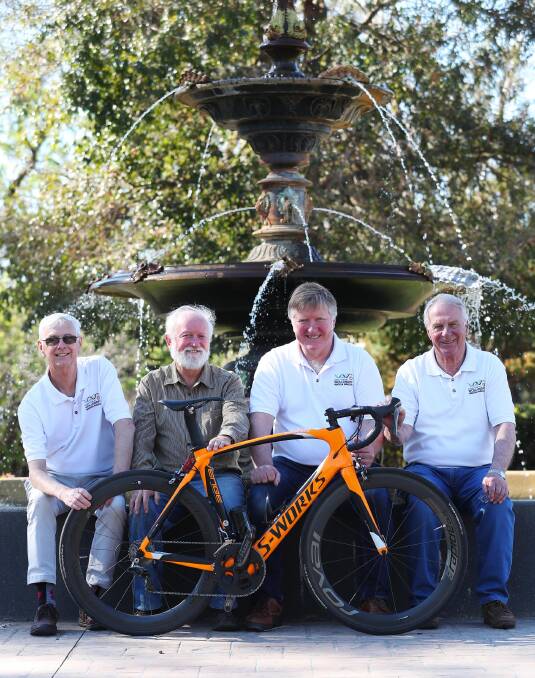 FUN IN THE GARDENS: Wollundry Rotary's Michael Knight, James Hamilton, James Ross and Bob Willis ahead of the festival in Victory Memorial Gardens. Picture: Emma Hillier