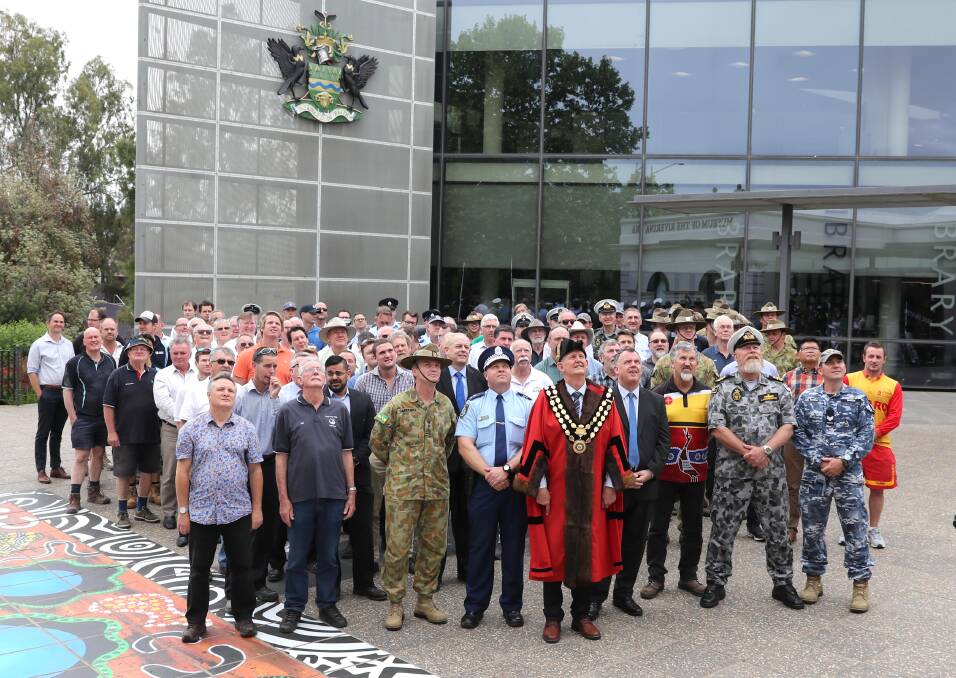 Last year, mayor Greg Conkey launched his 'shatter the silence, say no to domestic violence' campaign with the help of a group of men from across the community. Picture: Les Smith