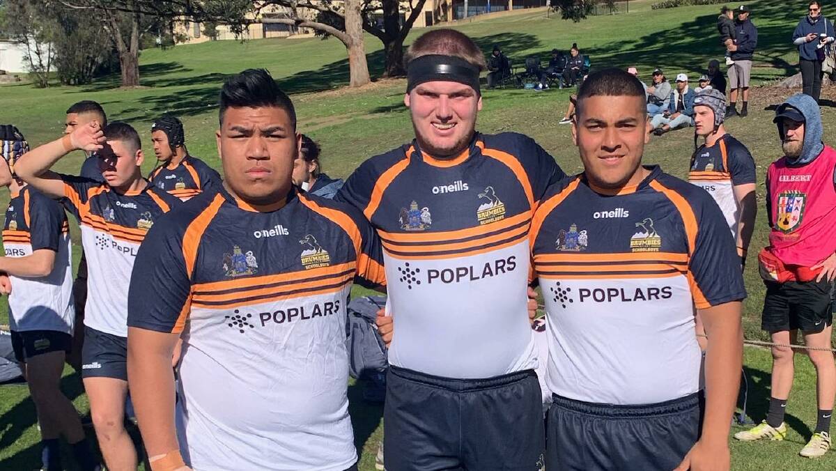 Nathanael Mooney, centre, with fellow Riverina talent Robert Ropeti and Luke Tudulu at the under 18s national championships this month.