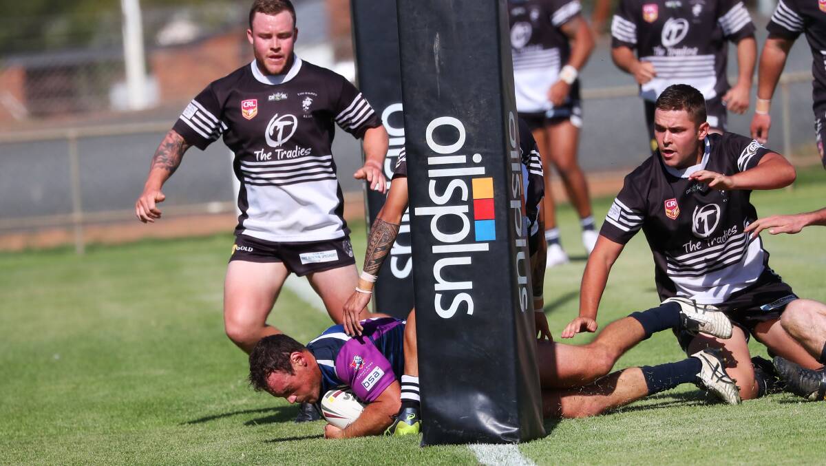 TRY TIME: Ben Lucas crashes over to open the scoring in Southcity's quarter-final win at the West Wyalong Knockout on Saturday. The Bulls were controversially knocked out by eventual champions Goulburn in the semi-finals. Picture: Emma Hillier