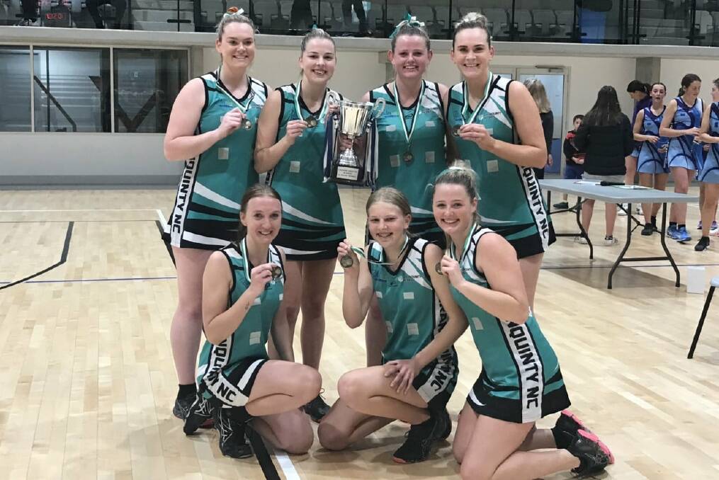 SWEET SUCCESS: Uraquinty celebrate after taking down New Kids Aces in the Wagga netball grand final for the second year running on Wednesday night.