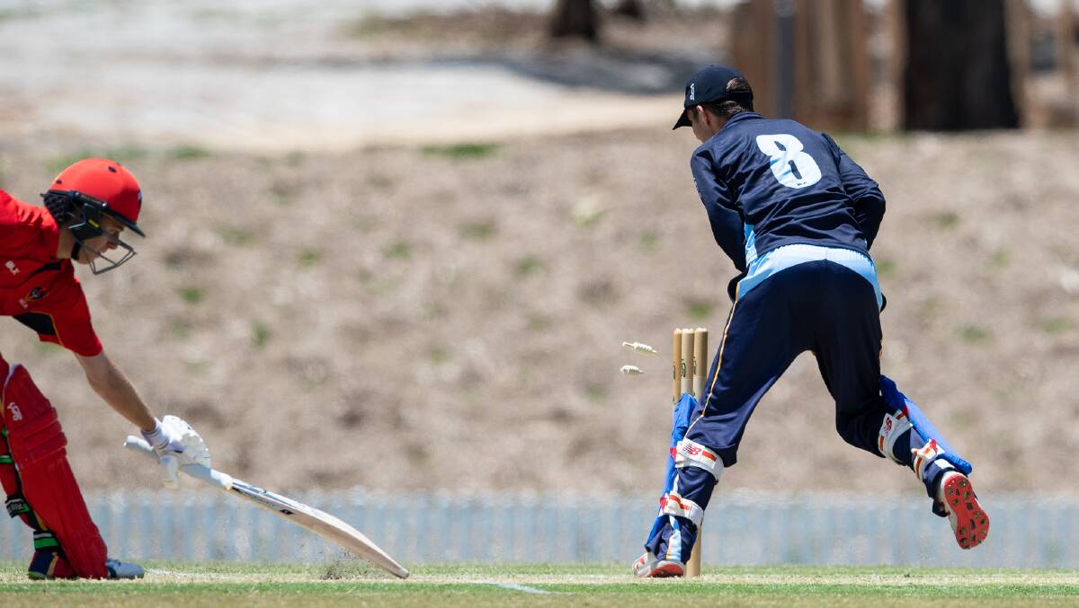 GOT HIM: Josh Staines completing a run out for ACT/NSW Country in the under 19s national championships last week. The semi-finals are on Wednesday.